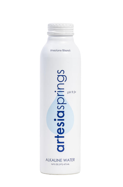Artesia Springs alkaline water bottle on a white background